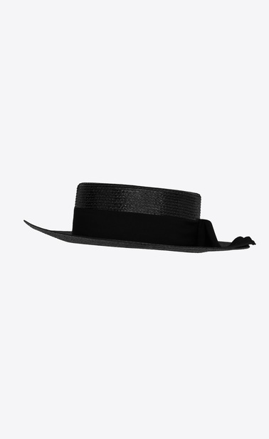 Large boater hat in varnished straw